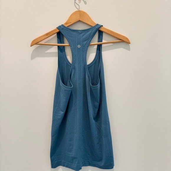 Lululemon Swiftly Tech Racerback in blue illuminight
Size 6 - Picture 8 of 8
